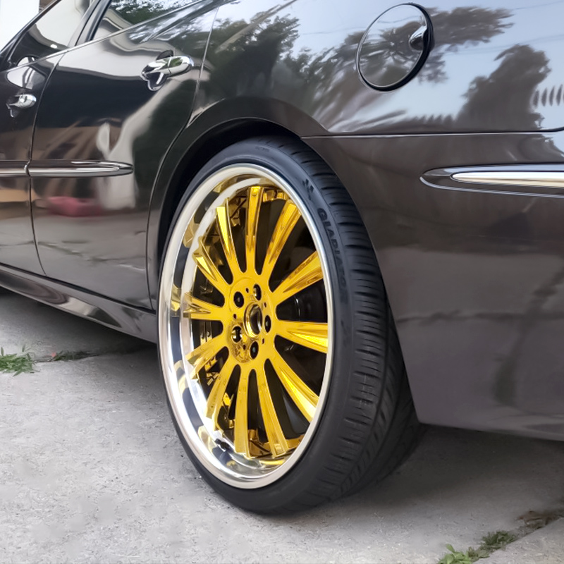 Gold-finish custom forged wheel installed on a customer's car